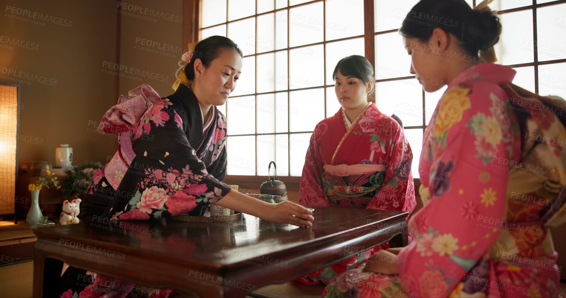 Buy stock photo Japanese, women and kimono for tea ceremony in Chashitsu with matcha or custom tradition. People, temae and vintage style outfit or dress for culture, heritage and happy with waiting and pride