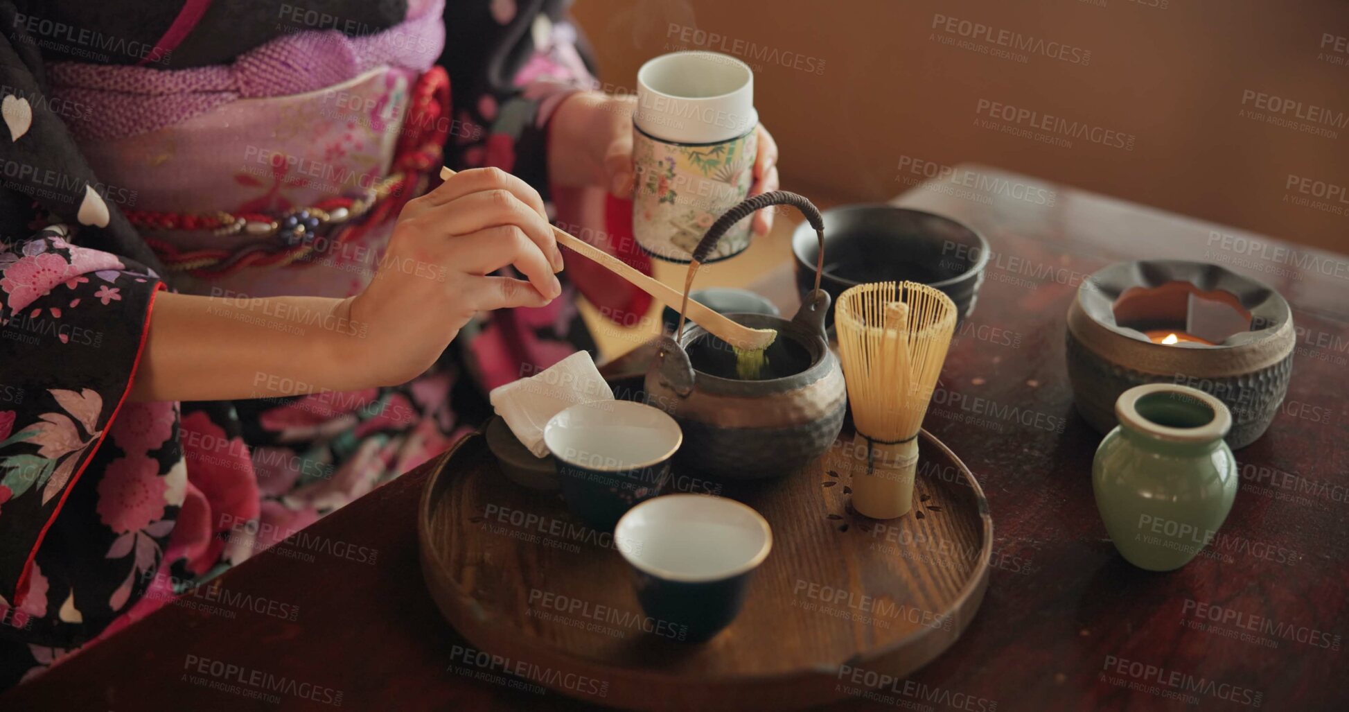 Buy stock photo Traditional, matcha and Japanese woman with tea in home with herbs, powder and flavor in teapot. Ritual, indigenous culture and hand of person with herbal beverage for drinking, ceremony and wellness