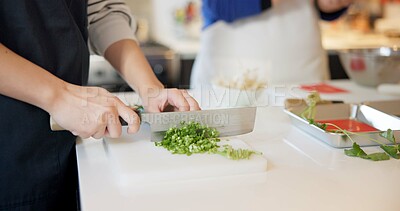 Buy stock photo Chef hands, knife and spring onion in restaurant, chopping and prepare ingredients for catering services. Person, cutting vegetables and cooking food for diet, nutrition and health at Japan Tokyo