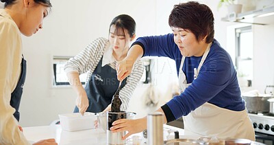 Buy stock photo Cooking class, restaurant and women with Japanese teacher and food in a kitchen learning professional skill. Student, education and Asian cuisine course with people together working on skills