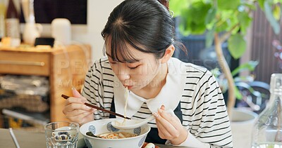 Buy stock photo Restaurant, food and Japanese woman with noodles for eating meal, lunch and dinner in cafe. Ramen, cafeteria supper and person with chopsticks for traditional cuisine for health, wellness and hunger