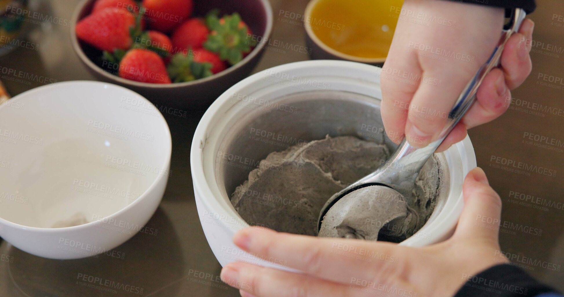 Buy stock photo Hands, ice cream and fruit in kitchen for cooking or preparing dessert on wooden table from above. Food, strawberry or ingredients for recipe with professional culinary chef in restaurant or class