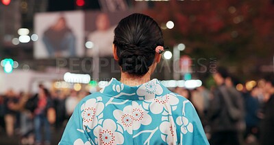 Buy stock photo Travel, city and Japanese woman in kimono on street with crowd for culture, heritage or tradition. Back, fashion and person walking outdoor on street of urban Tokyo town for vacation or sightseeing