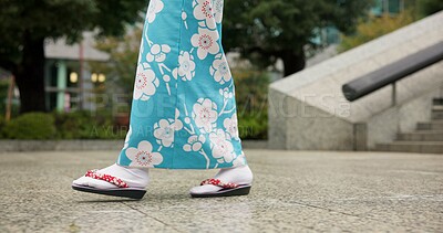 Buy stock photo Person, Japanese and feet walking in kimono in city or local commute or traditional, outdoor or downtown. Legs, sandals and Tokyo street or urban road journey as healthy wellness, culture or trip