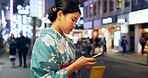 Street, Japanese woman and smartphone with typing, internet and social media with traditional clothes. Person, outdoor and girl with a cellphone, mobile user and contact with network and digital app