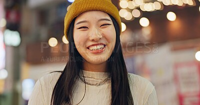 Buy stock photo Woman, Japanese and portrait in street at night for Tokyo travel destination, journey or happy. Female person, face and smile or road city light bokeh for holiday adventurer, vacation or downtown