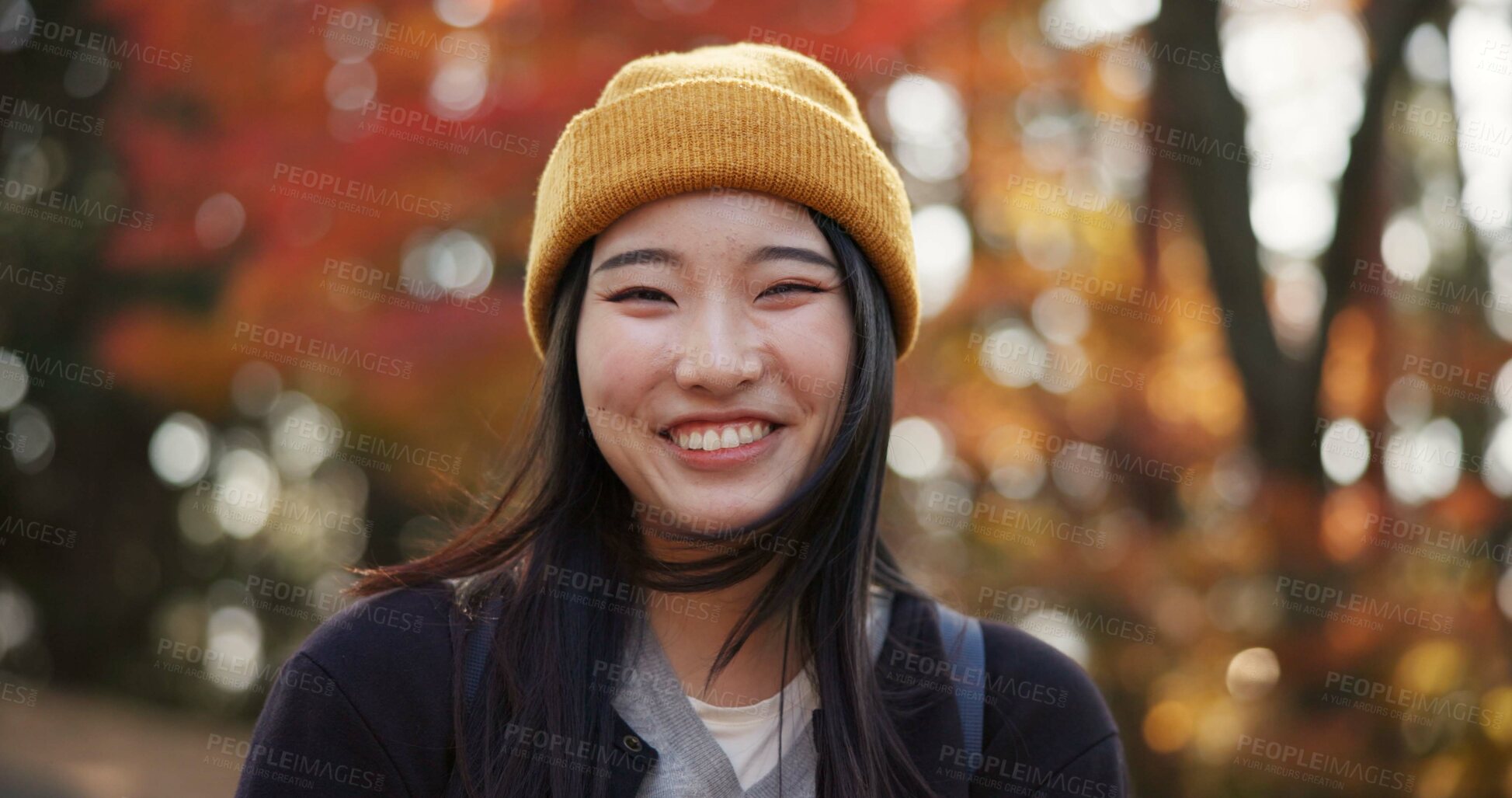 Buy stock photo Woman, forest and portrait in Kyoto, garden and tourist with happiness, traditional history and travel. Nature, japanese culture and explore in woods with trees, adventure and holiday walk in autumn