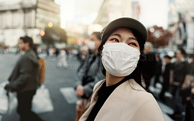 Buy stock photo City, japan and woman in travel with face mask for health and walking in town. Covid compliance, safety for wellness and female person outdoors with facial protection for corona virus pandemic