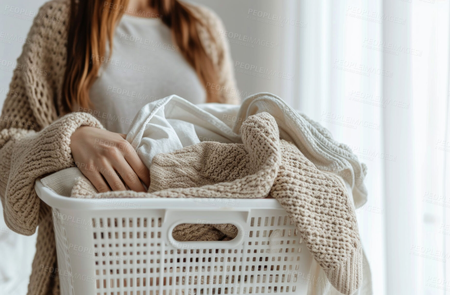 Buy stock photo Cropped woman, clean laundry and clothes in a washing basket at laundromat, home and self service. Fresh, hygienic and closeup of pile of clothing for textile, fabric softener and cleaning duties