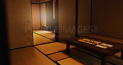 Interior, dojo or house in Japan of temple, tradition or culture with wooden table and structure. Empty room of Japanese home, furniture or building in Tokyo with carpet, tatami mat or bamboo floor