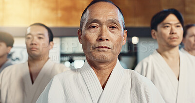 Japanese man, face and sensei in aikido for respect, honor and dignity with group in martial arts class. Portrait of male person or people in commitment for self defense, training or practice at gym