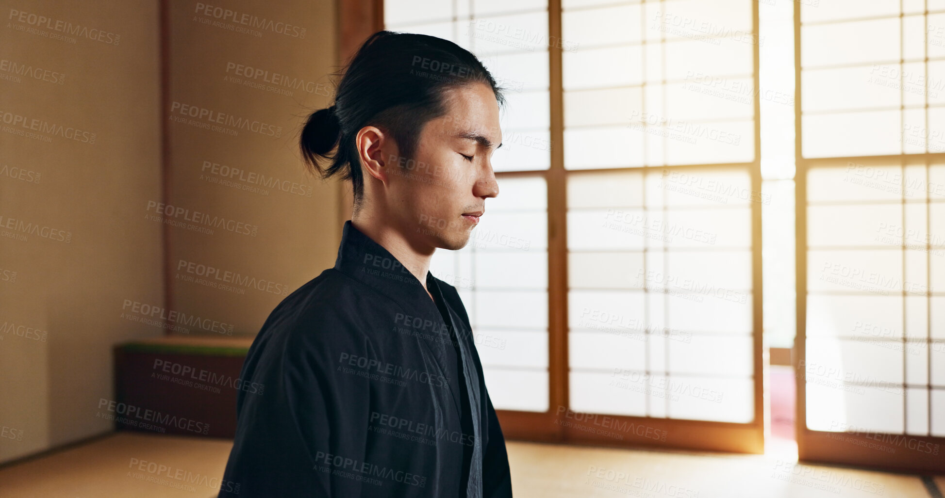 Buy stock photo Martial arts man, meditation and training in Japanese dojo with mindfulness, zen or chakra balance in morning. Fighter, mma or karate person with peace, breathing and calm for yoga, wellness or floor