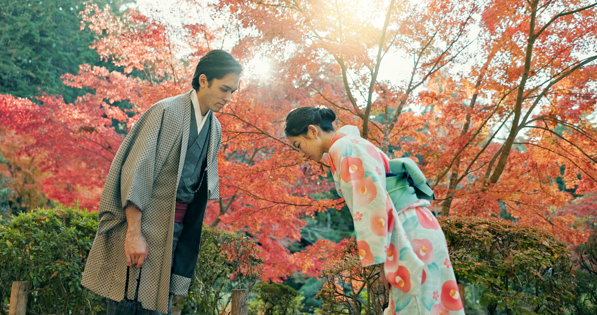 Buy stock photo People in park in Japan, bow and traditional clothes with hello, nature and sunshine with respect and culture. Couple outdoor together in garden, greeting with modesty and tradition, polite and kind