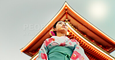 Buy stock photo Woman, Japanese shinto temple and traditional clothes for culture, building or religion in sunshine. Person, ideas and vision for buddhism with faith, mindfulness or thinking with low angle in Kyoto