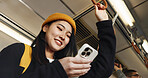 Japanese woman, phone and texting in train, smile and travel with click, press and check schedule on app. Girl, person and smartphone with chat, reading blog and social network with public transport