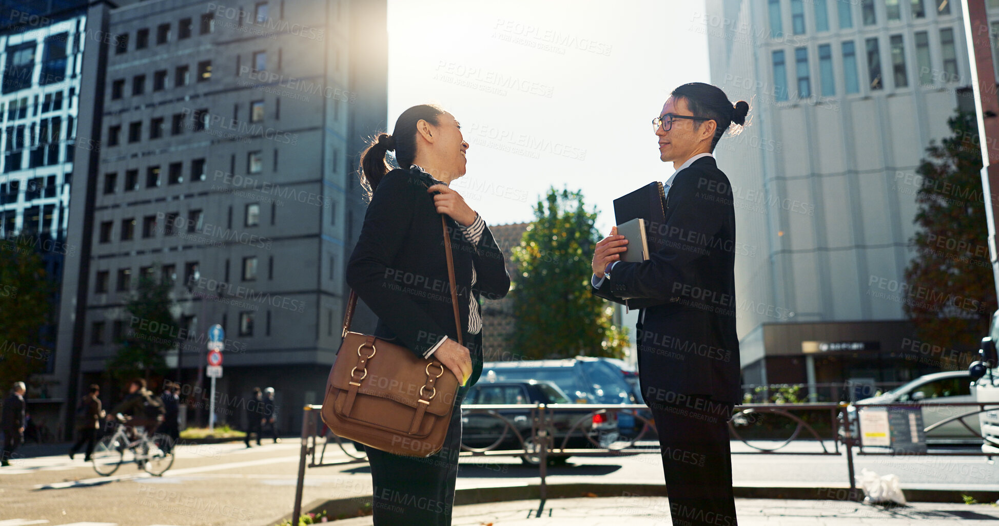 Buy stock photo Asian, business people in city and bow for greeting, conversation with travel and commute to work. Professional man, woman and hello in Tokyo, journey and urban street, communication and respect
