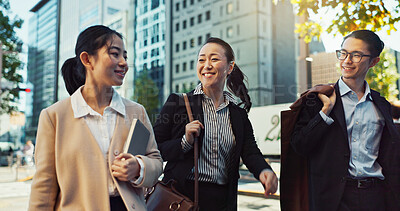 Buy stock photo Asian, business people in city and travel, talking and walking with commute to work, conversation and bonding. Journey on urban street, friends chat with communication and happy commuting together