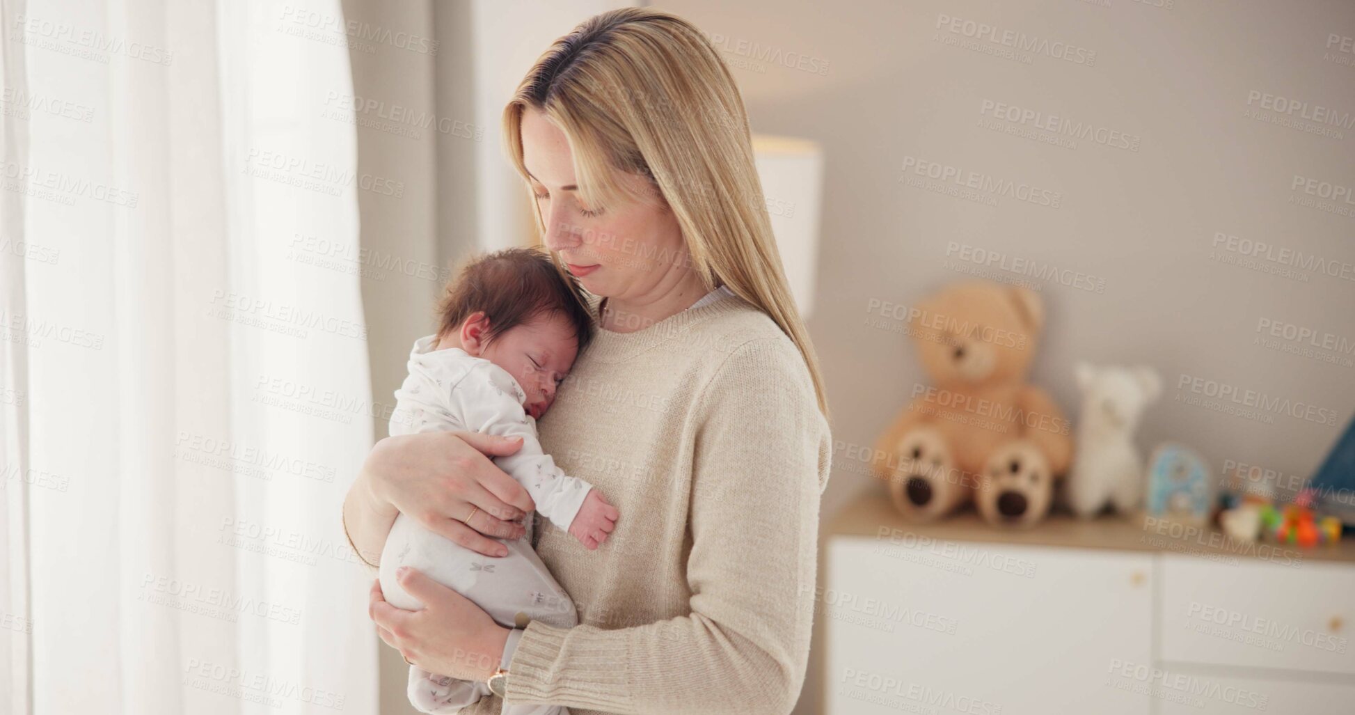 Buy stock photo Sleeping, love and mother with baby in home for bonding, relationship and child development together. Newborn, motherhood and mom carry asleep infant for care, dreaming and affection in nursery room