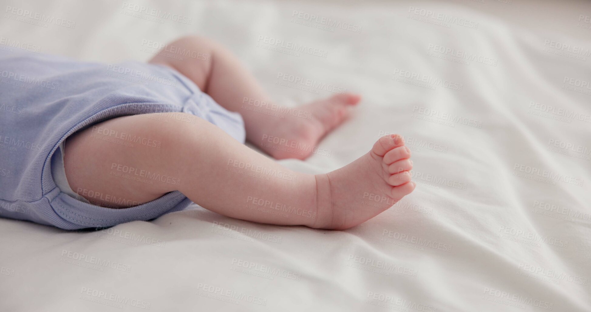 Buy stock photo Adorable, family and feet of baby on bed for child care, relax and resting in nursery. Innocent, cute and closeup of toes of innocent newborn infant for health, wellness and development at home