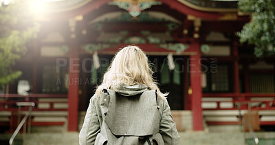 Buy stock photo Torii gate, woman or back in japan for worship, holy or prayer location for peace in culture. Kyoto architecture, person and Fushimi Inari Taisha with religion and gateway of sacred to shinto shrine