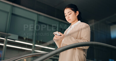 Buy stock photo Japanese, escalator and travel with businesswoman, phone or social media with internet, employee or convention. Person, consultant or worker with airport, communication or connection with mobile app