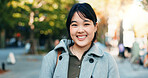 Japan businesswoman, face and happy in city for company travel and street for ambition or startup entrepreneur. Portrait, person and smile for summer trip for career growth and job pride in kyoto