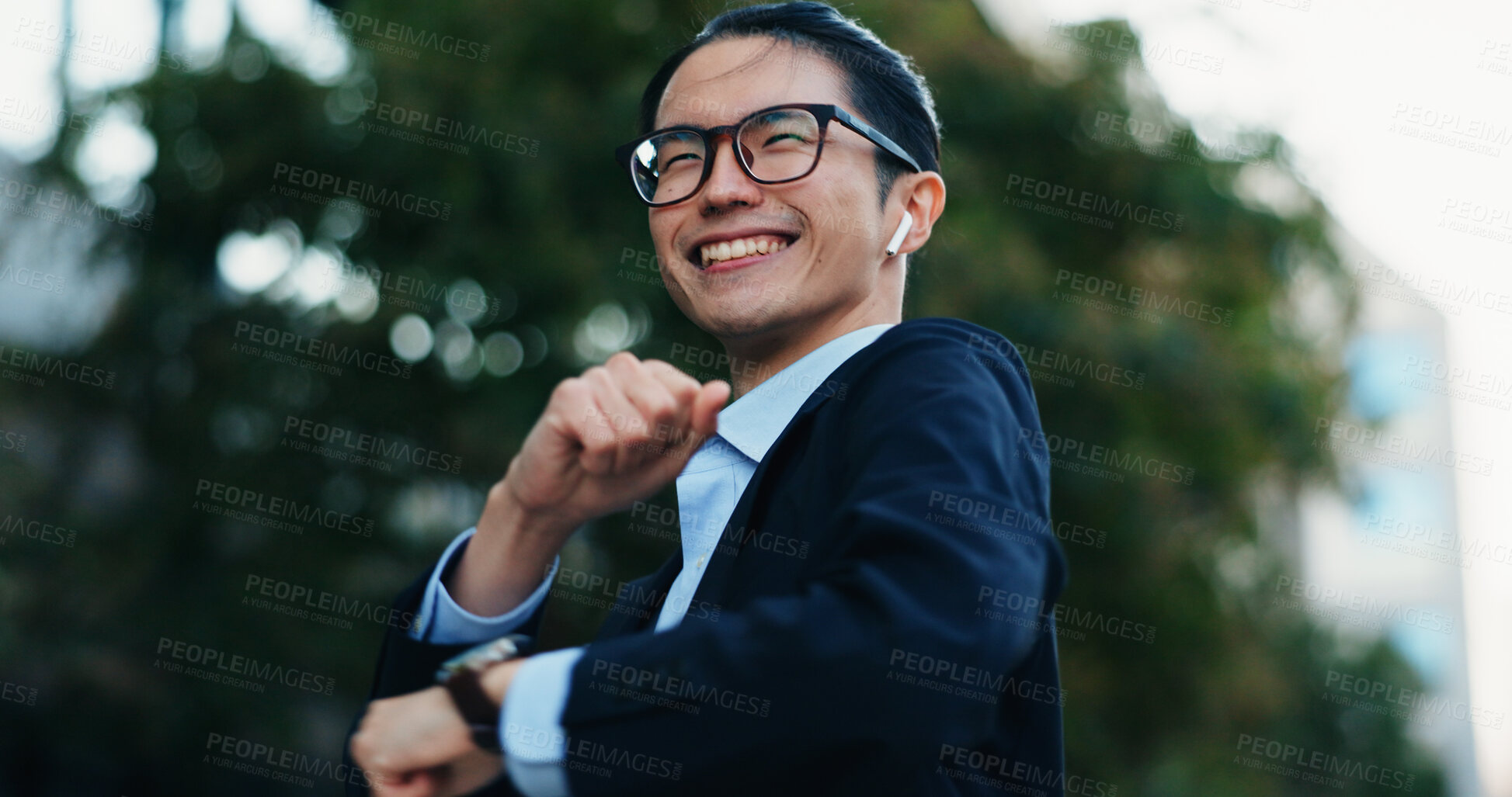 Buy stock photo Happy, dancing and Japanese businessman in the city with good news, job promotion or achievement. Smile, excited and professional young male person moving to music, playlist or radio in urban town.