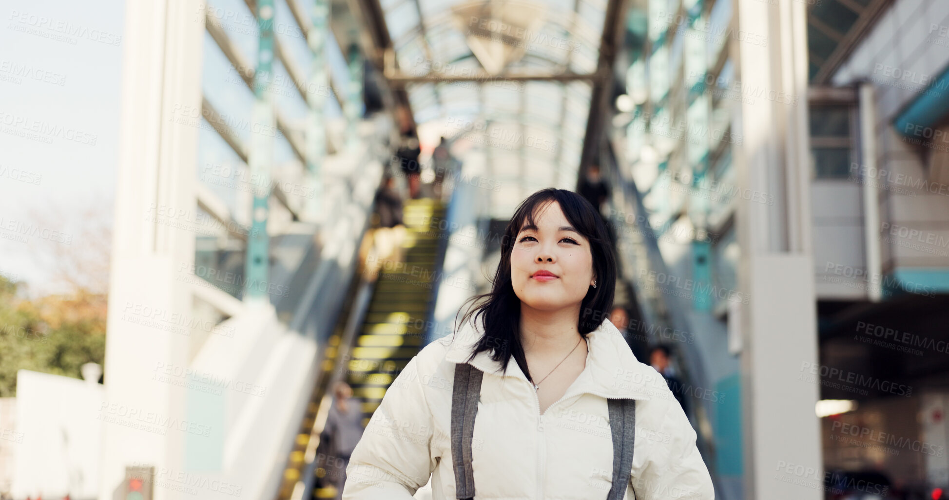 Buy stock photo Walking, thinking and Japanese woman in city on commute, travel and journey in metro. Student, fashion and person with trendy clothes, backpack or bag for university, college and adventure in town