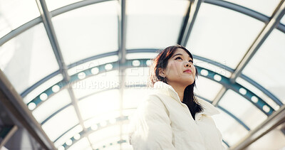 Thinking, city and Japanese woman on bridge on commute, travel and journey in metro. Student, fashion and person with trendy clothes, backpack or bag for university, college and adventure in town