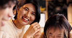 Japanese friends, laughing and talking in restaurant for dinner, vacation and hungry to order healthy food. Women, man or happy together on lunch in tokyo city or funny joke by bonding in coffee shop