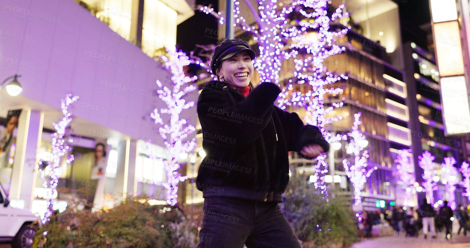 Buy stock photo Woman in Japan, dancing in city at night with energy and fun, happiness and freedom outdoor. Celebration, party and music with Japanese dancer on urban street, light and positivity for nightlife