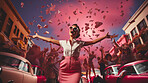 Woman, pink dress and joy under pink clouds. Elegant, radiant and blissful lady showing happiness, positivity and celebration. Joyful moment in a dreamy, pink atmosphere.