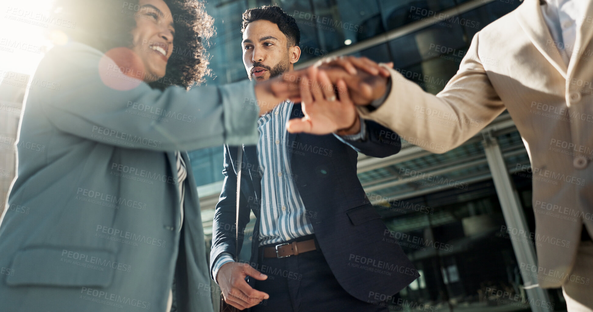Buy stock photo Business people, hands stack celebration and excited in city for goals, support and profit on investment. Men, woman and cheers together for winning, success and achievement with team in Cape Town