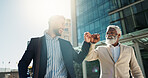 Business men, fist bump and team in street with smile, support and respect on walk to investment company. Partnership, friends and staff with hello, happy and commute on city sidewalk in Cape Town