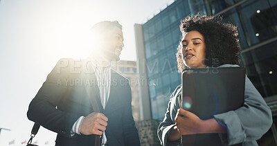 Outdoor, business people and conversation with handshake, greeting and contract with lens flare, corporate and smile. Travel, employees in a city and coworkers with hello, partnership and friends