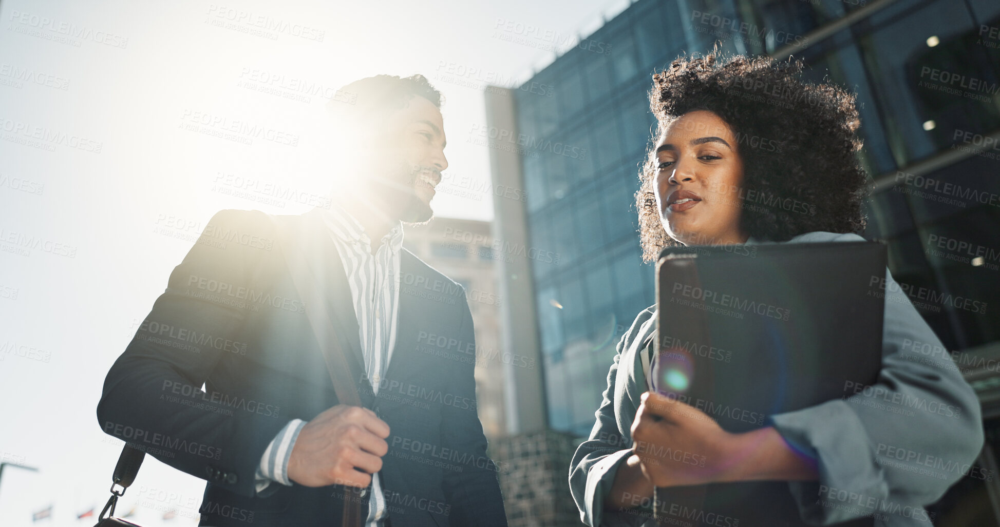 Buy stock photo Outdoor, business people and conversation with handshake, greeting and contract with lens flare, corporate and smile. Travel, employees in a city and coworkers with hello, partnership and friends