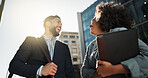 Outdoor, business people and conversation with handshake, greeting and contract with lens flare, corporate and smile. Travel, employees in a city and coworkers with hello, partnership and friends