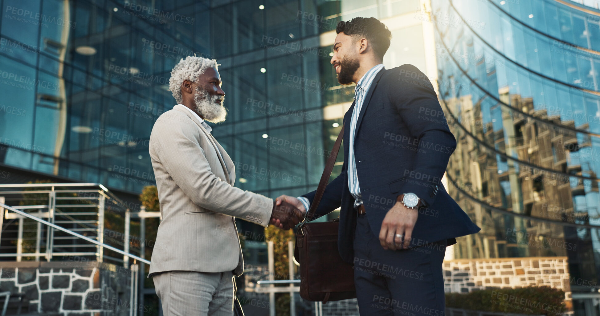 Buy stock photo Business men, handshake and meeting in city for b2b partnership, outdoor deal and travel introduction or welcome. Corporate clients and senior boss shaking hands with time or schedule for consulting