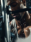 Man, bodybuilder and sweat on athlete skin in workout, exercise or fitness with strong, muscle in gym for healthy life. Dark, background and contrast or anatomy of person with fitness from training