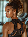 Black woman, back and sweat on skin in workout, exercise or bodybuilder with strong, muscle and looking for healthy cardio. Gym, background and texture or anatomy of person with fitness for training