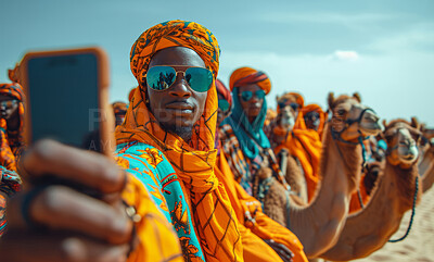 African man, desert and camel with smartphone for travel, freedom or vacation. Health, activity and outdoors with middle eastern and sunset view for wellness, motivation or discovery in nature