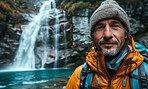 Waterfall, portrait and selfie with hiking gear for travel, freedom or vacation. Health, activity and outdoors with person on landscape view for wellness, motivation or discovery in nature