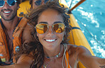 Young woman, selfie portrait and swimming with group for travel, freedom or vacation. Healthy, happiness and outdoors with friends on beach for wellness, motivation or discovery in nature