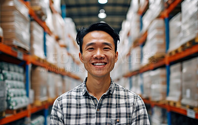 Warehouse, business and man employee or manager checking with happy smile for courier service, delivery or exports. Confident, successful and hard working male at factory for parcels or inventory
