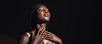 Face, hands and skincare with a natural black woman on a dark background in studio for feminine wellness. Arms, beauty and spa with a confident young model touching her body or skin in satisfaction