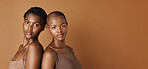 Wellness, face or black women with beauty, glowing skin or results isolated on brown background. Facial dermatology, African models or natural cosmetics skincare in studio with girl friends or people