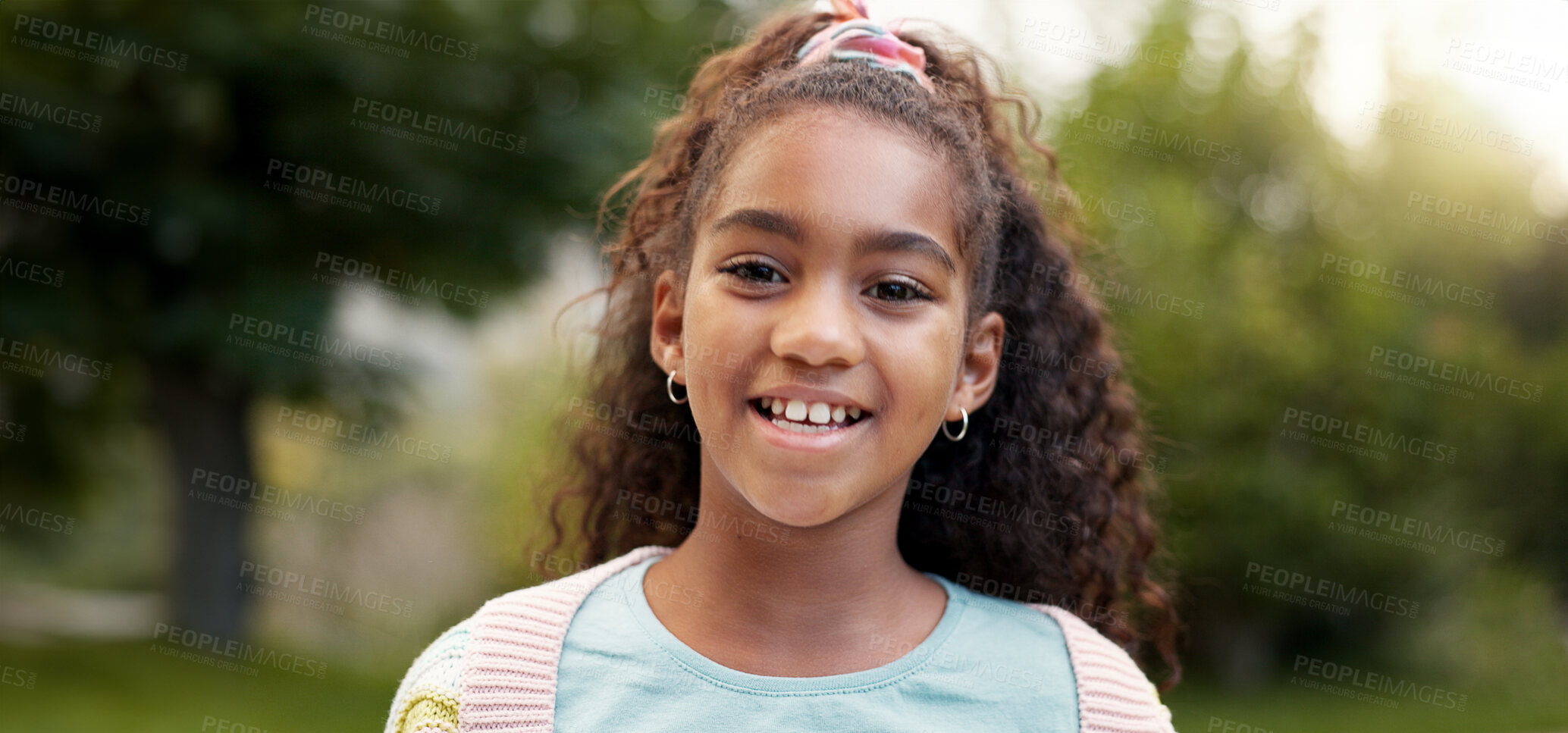 Buy stock photo Child, face and girl smile outdoor in a garden, park or green environment for fun and happiness. Portrait of a young african female kid with a positive mindset, cute hairstyle and nature to relax