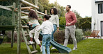 Family, running and children outdoor in backyard for playing, happiness and bonding at home. Young latino woman, man and happy kids at a playground while on holiday or vacation for a fun activity