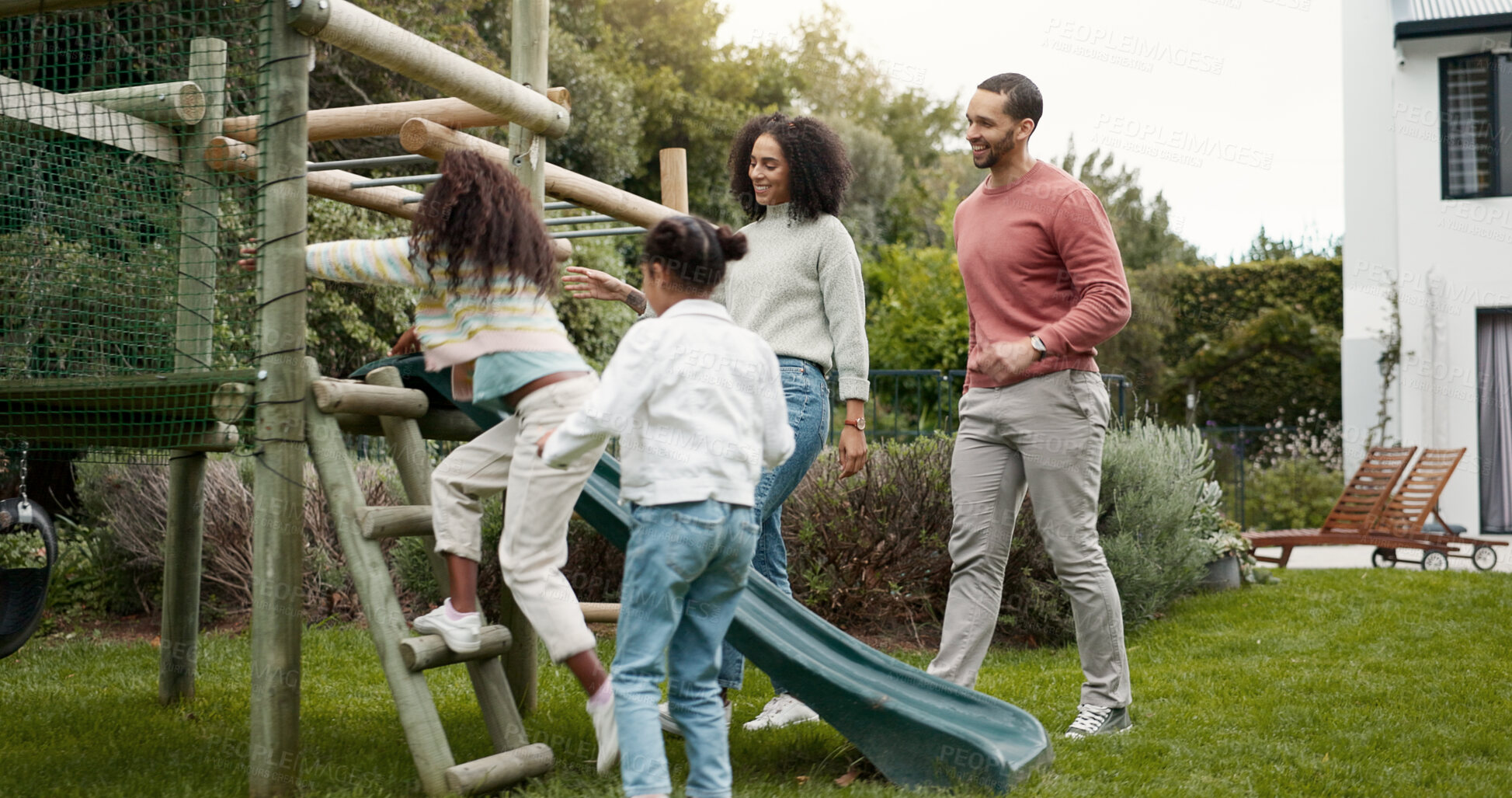 Buy stock photo Family, running and children outdoor in backyard for playing, happiness and bonding at home. Young latino woman, man and happy kids at a playground while on holiday or vacation for a fun activity