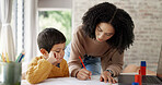 Homework, learning and help with mother and son for homeschooling, research and math. Education, study and teaching with woman and kid in family home for child development, writing and knowledge